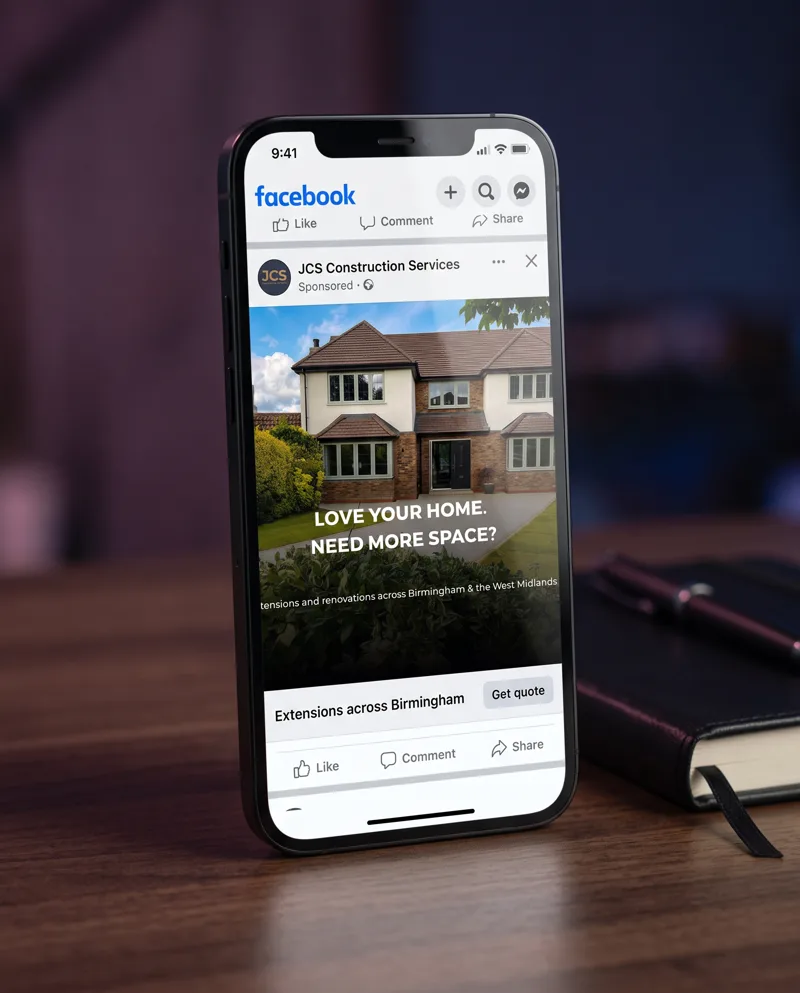 Phone showing a Facebook ad for JCS Construction Services: Love your home. Need more space?