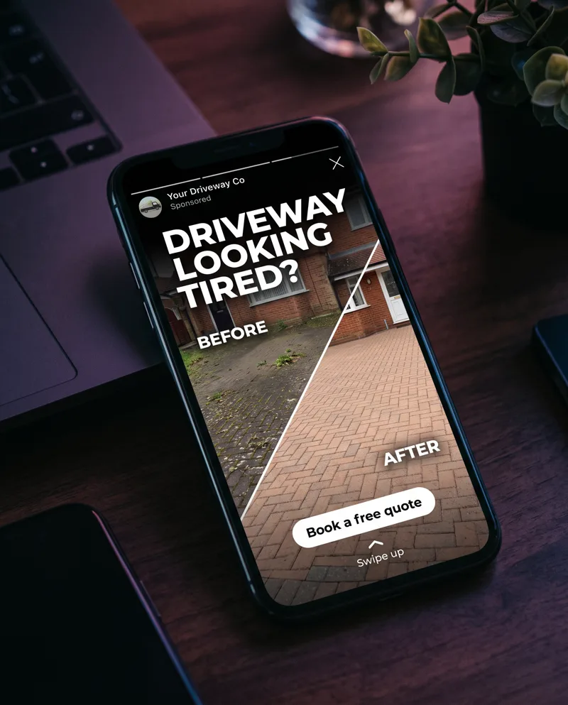 Phone showing an example Instagram Story ad for a driveway cleaner